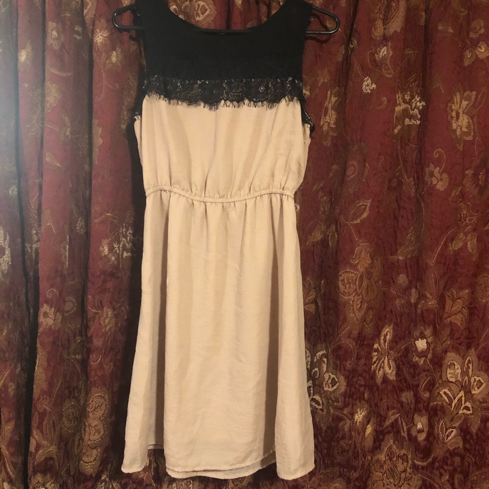 tan and black lace dress